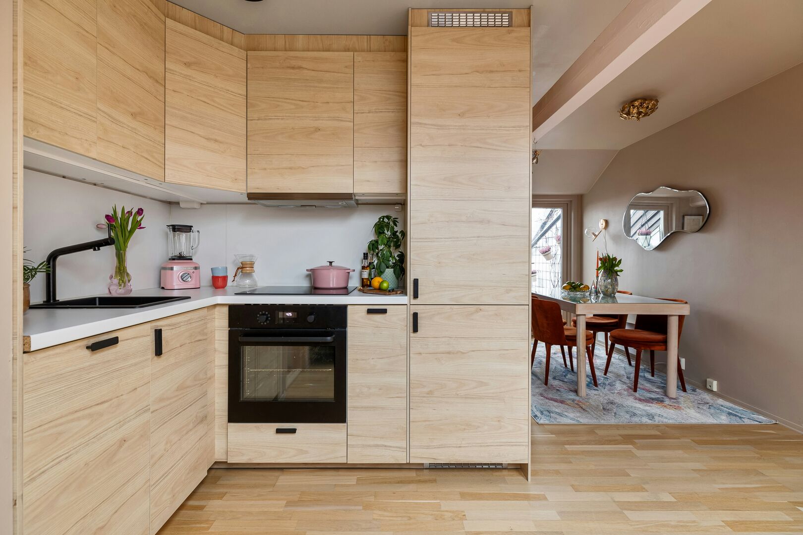 Modern L-shaped kitchen interior featuring a functional layout