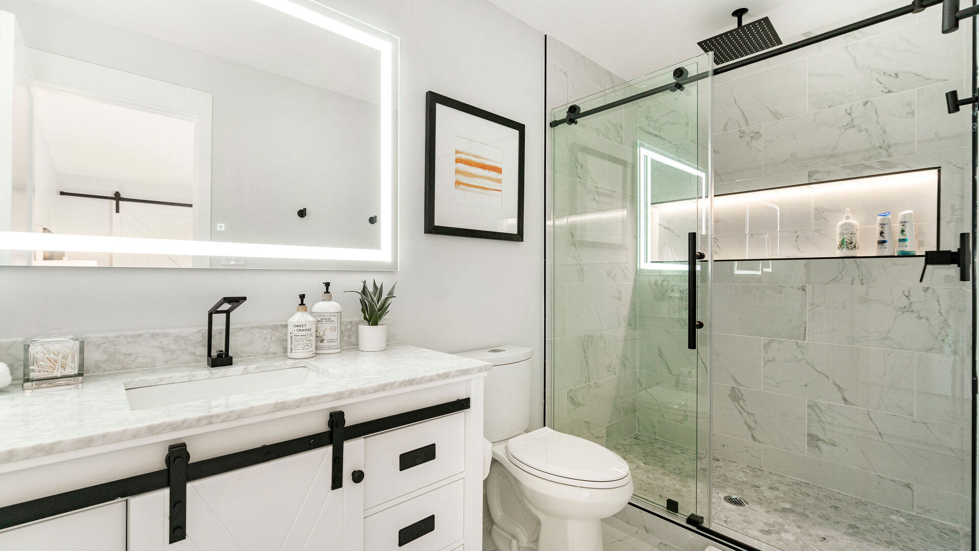 Modern white and black luxury bathroom remodel