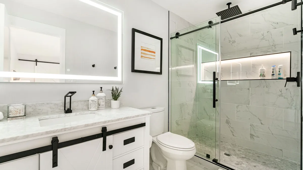 Modern white and black luxury bathroom remodel