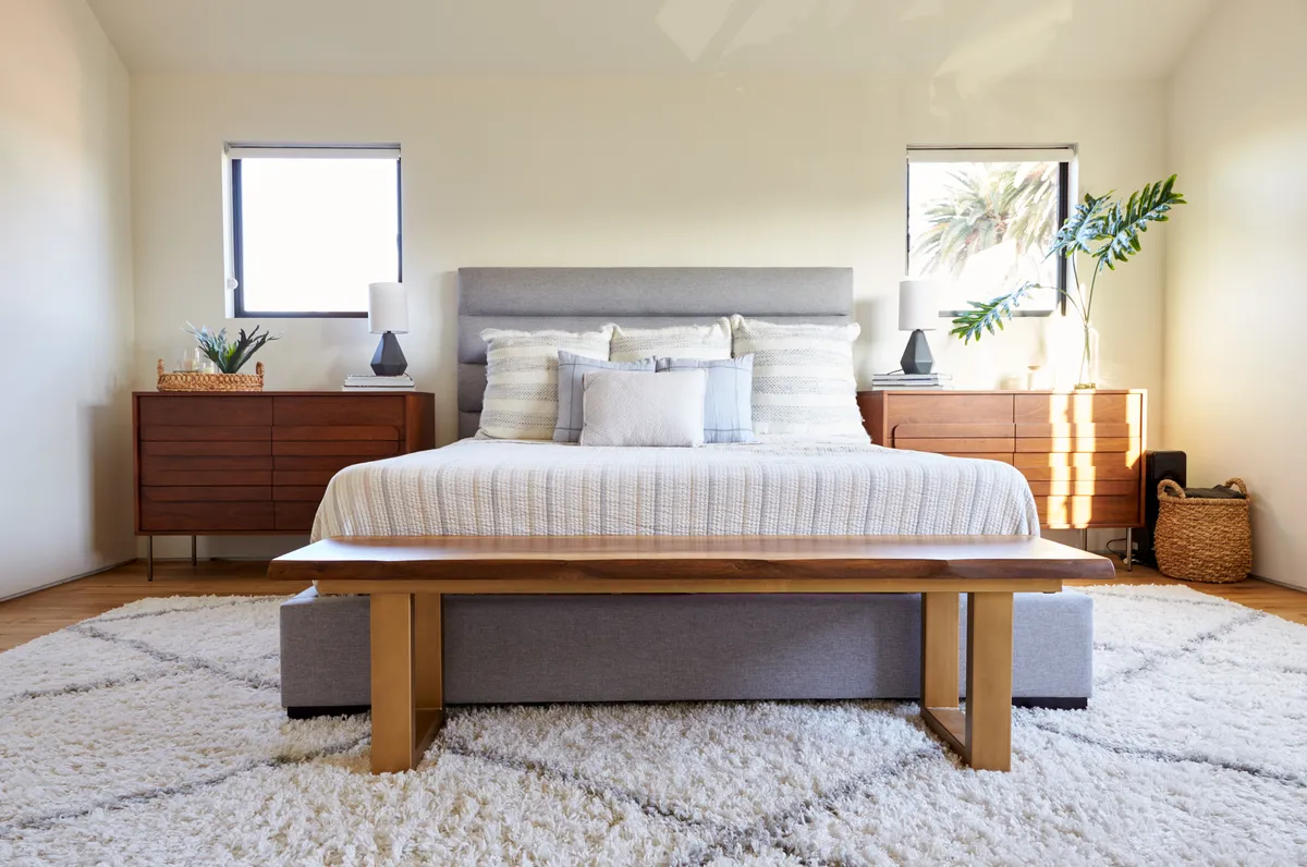 interior view of bedroom with cozy bed