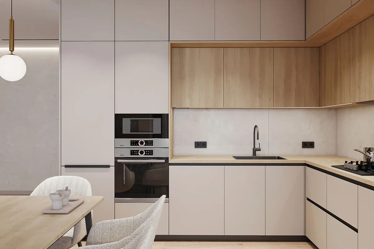 Contemporary kitchen corner with built-in oven, wood accents, soft cabinets, and black fixtures