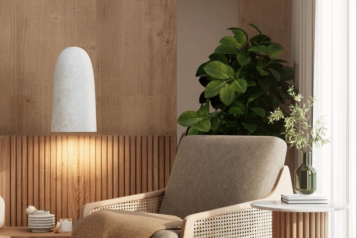 Modern living space featuring a wooden accent wall, a comfortable chair, a plant, and stylish decor elements