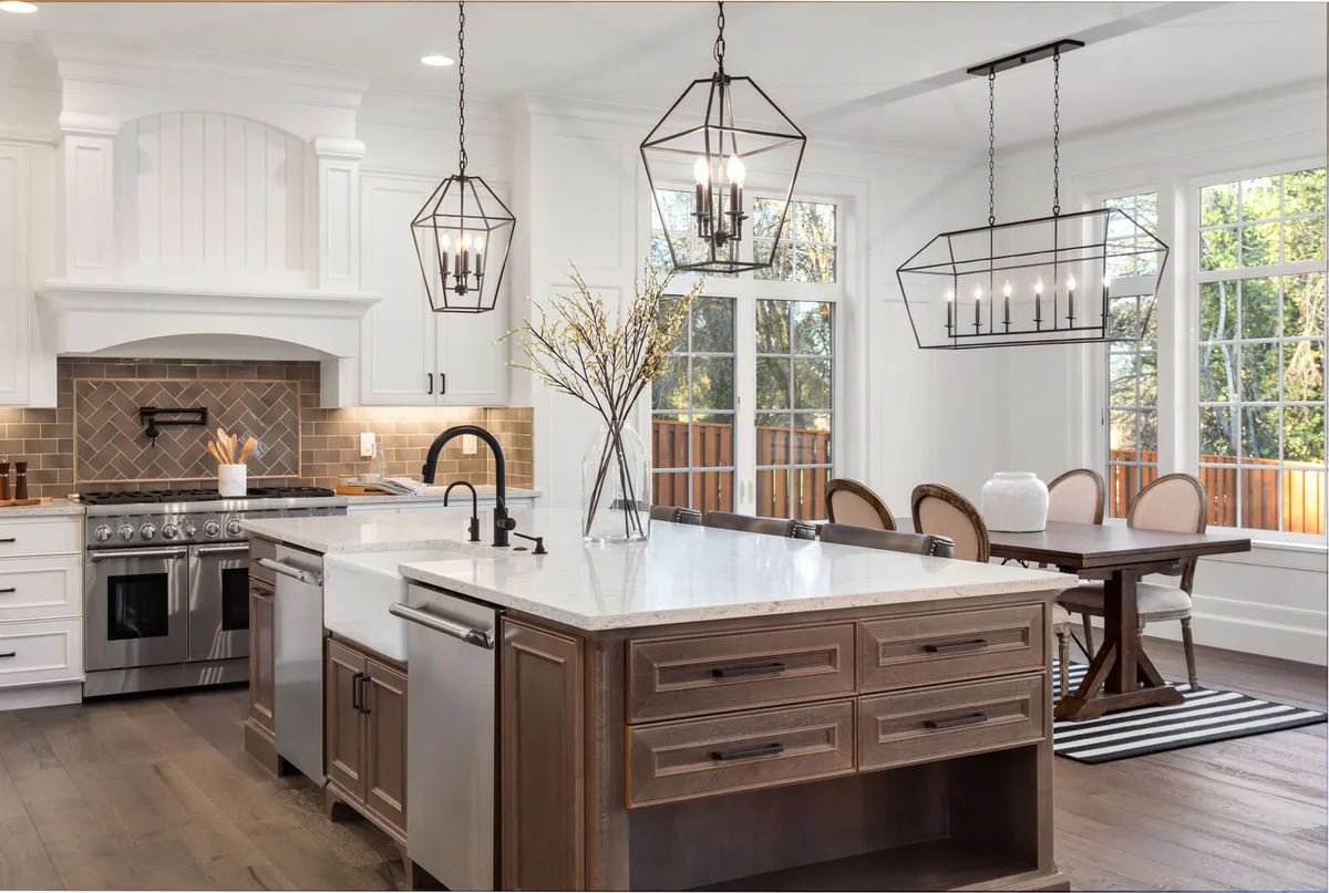 White and wood two tone kitchen in new traditional style luxury home