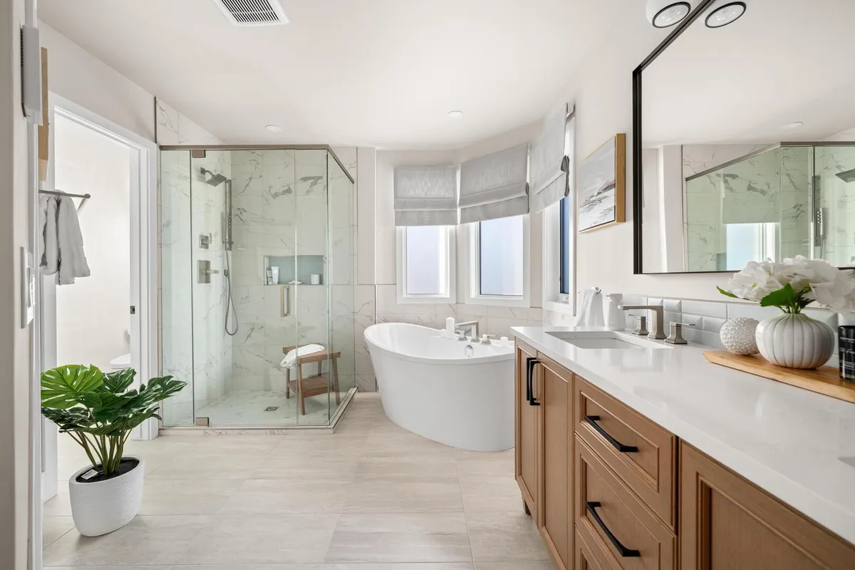 Large modern bathroom with soaker tub and glass shower