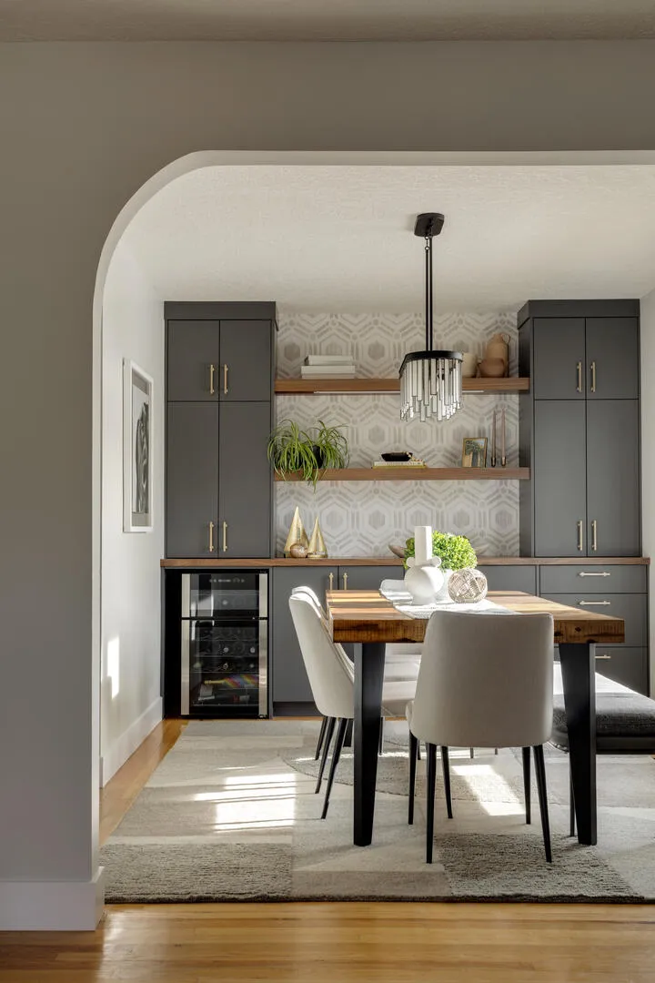 Archway architectural feature into light and bright dining room