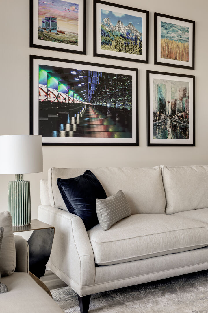 White couch in front of gallery wall detail