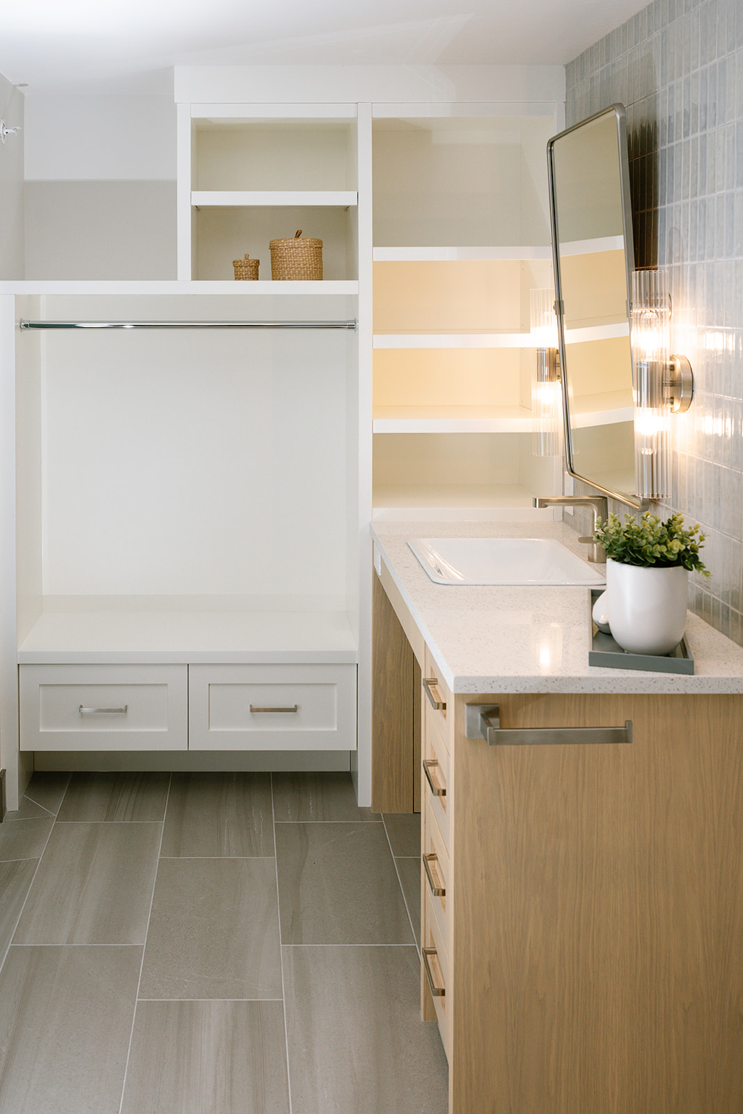 white oak vanity with roll under sink, custom storage.