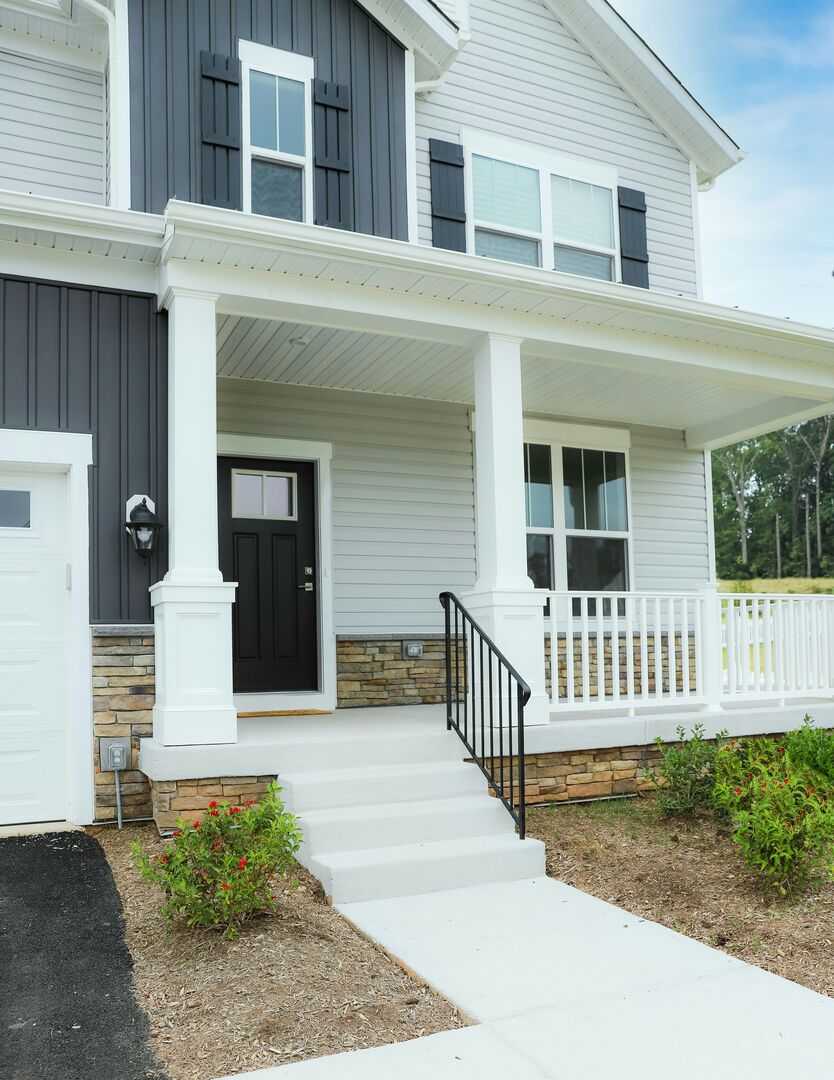 Black and white craftsmen new build home