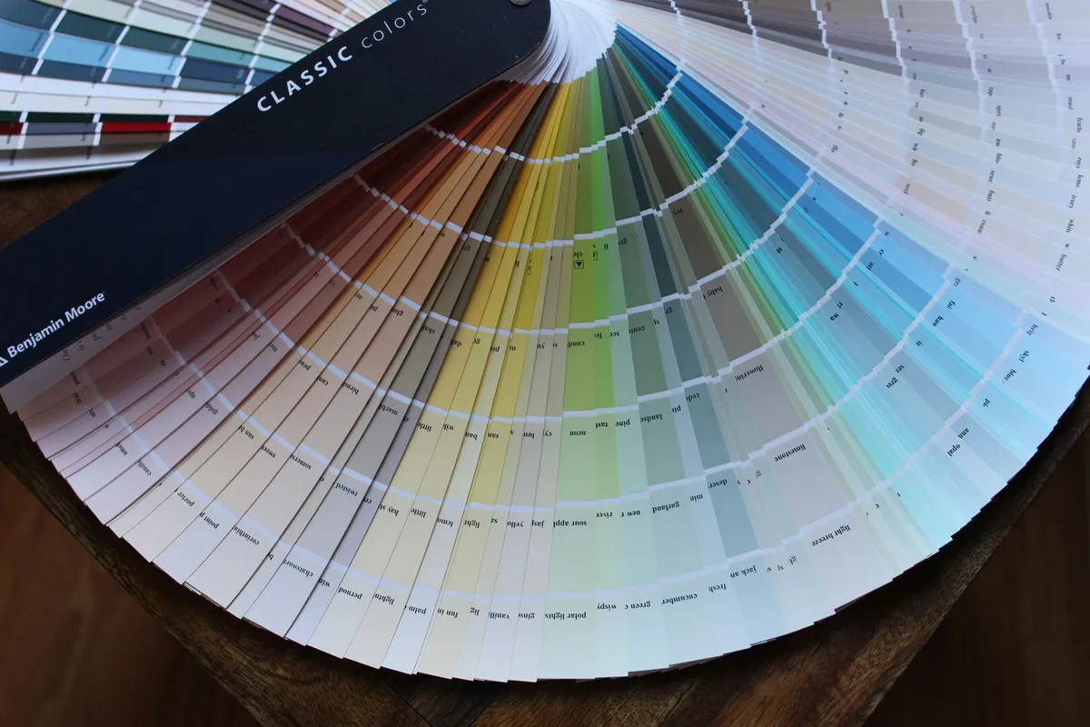 Paint fan deck on wooden table