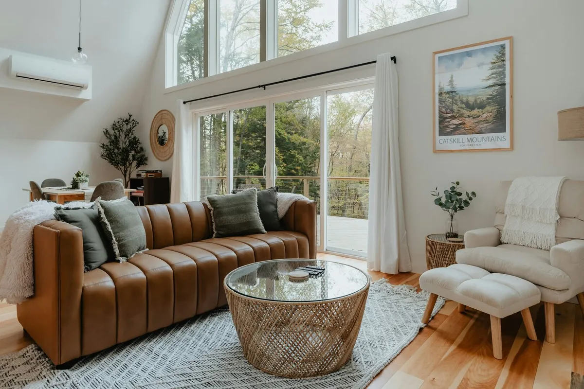 Light and bright cabin design, light and bright living room, neutral living room with big windows