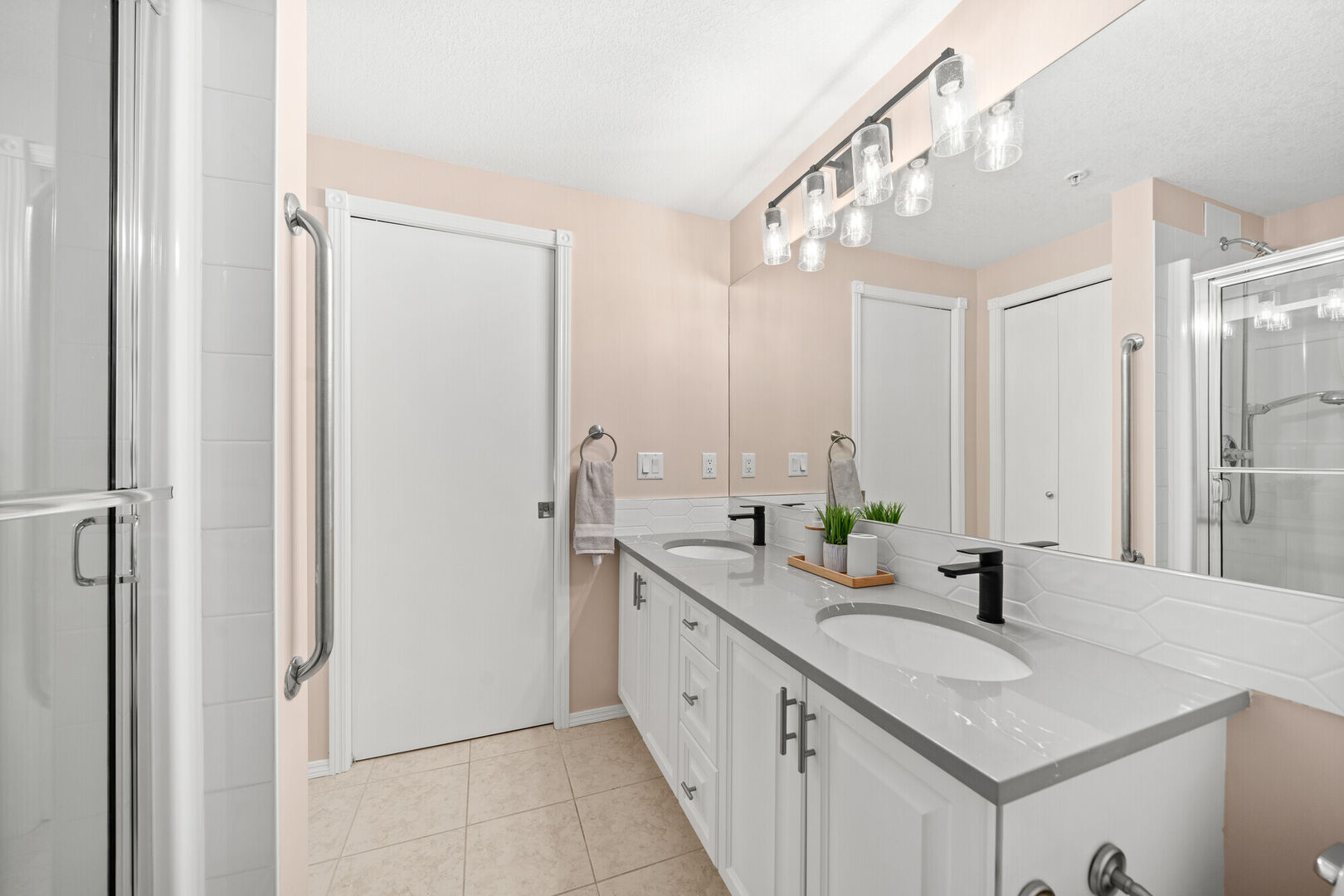 Country Village condo modern light bright white bathroom Calgary interior designer