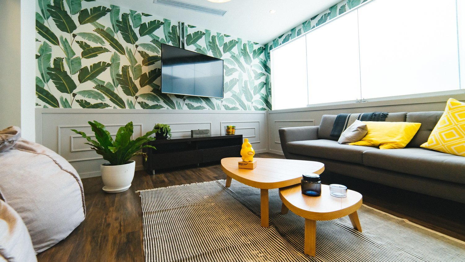 Living room with green leaf wallpaper natural design inspiration