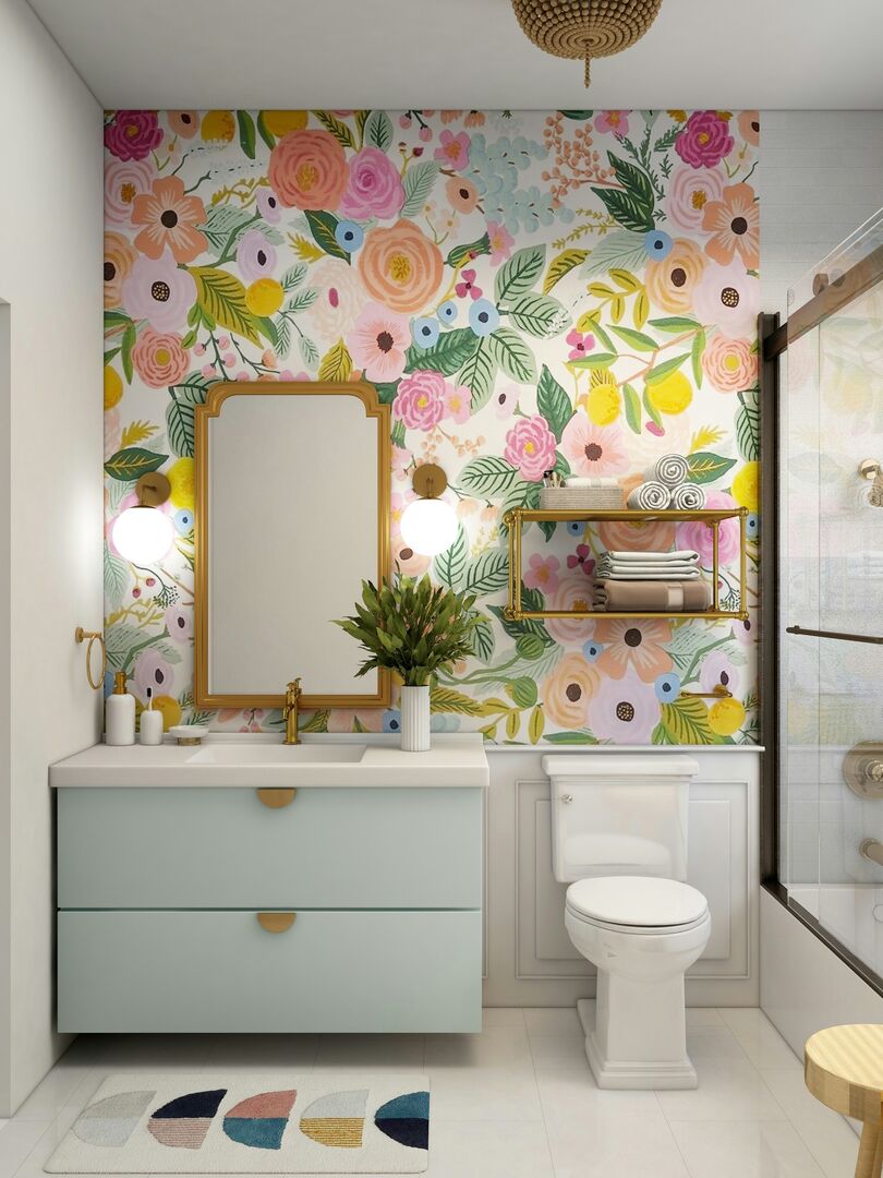 Bold bathroom with floral wallpaper and gold accents