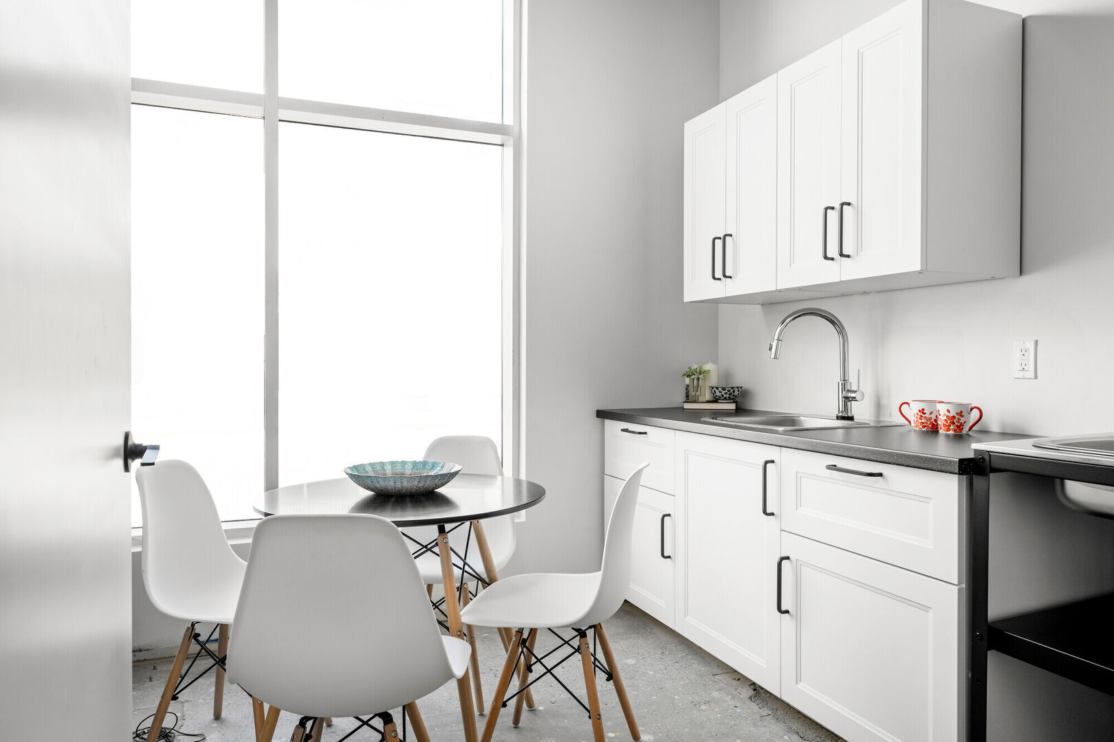 Calgary interior design commercial space kitchen modern clean light white bright