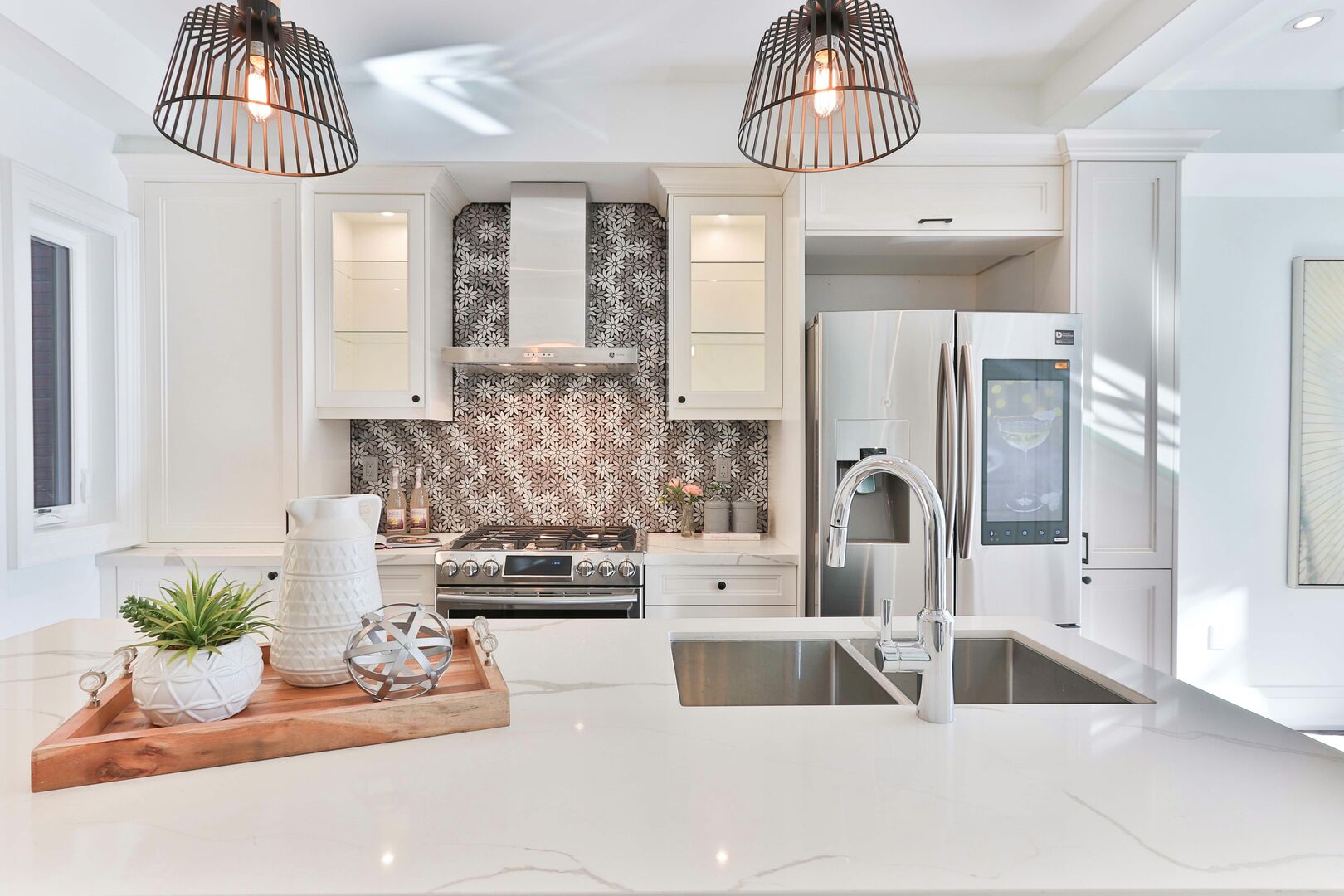 White kitchen with quartz countertops