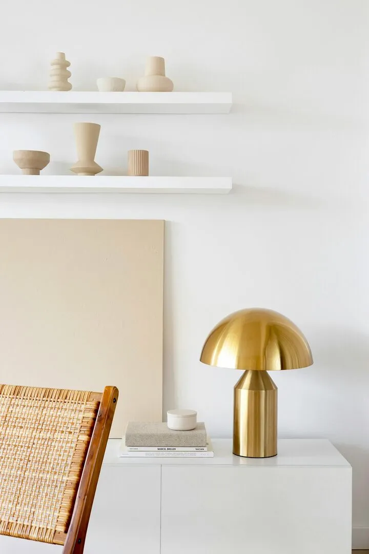 Neutral minimalist decor on floating shelves, minimalist shelf styling ideas