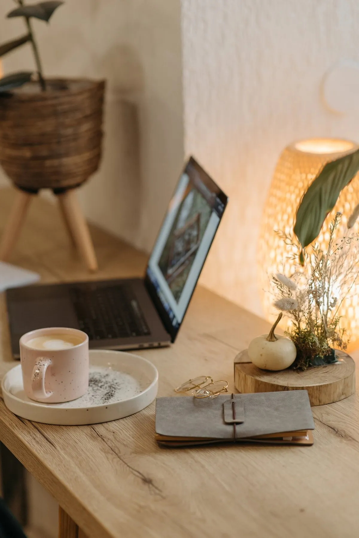Cozy rustic workspace with laptop and coffee mug