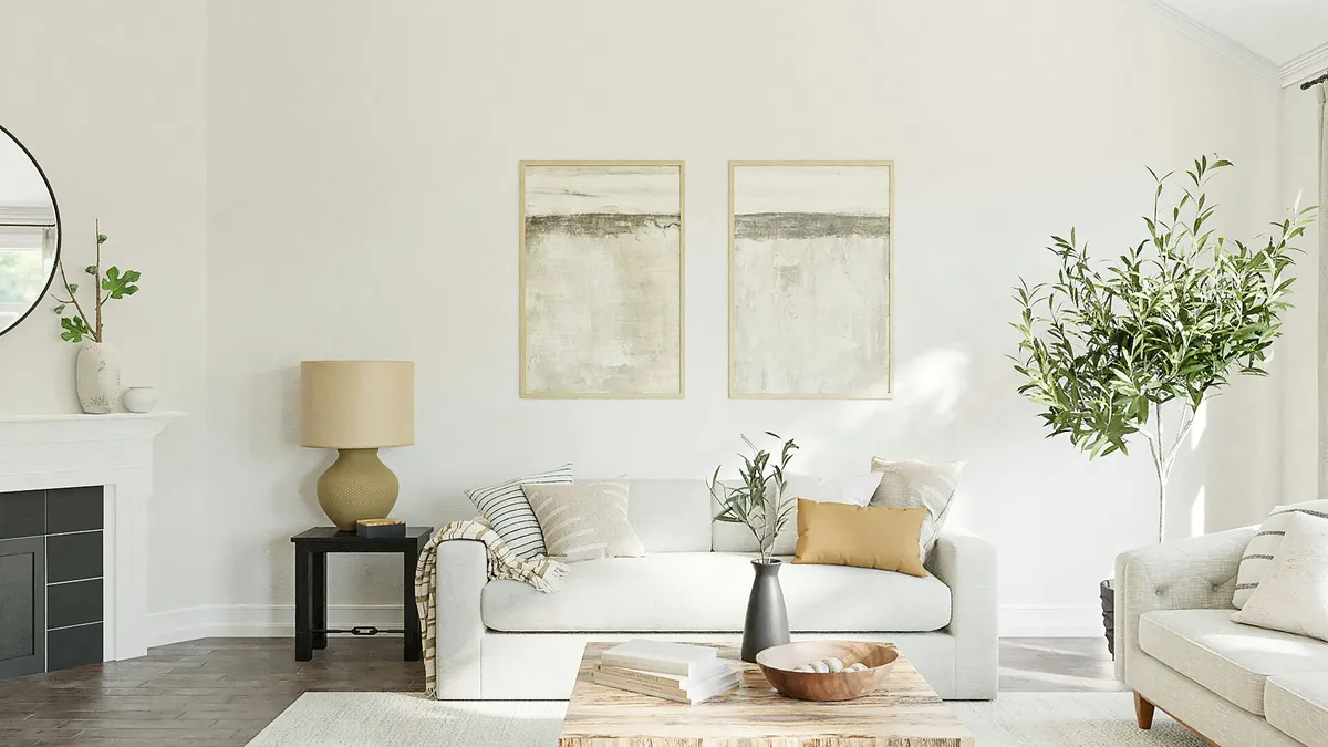 Light and bright white living room with an organic modern design style, white furniture and white rug