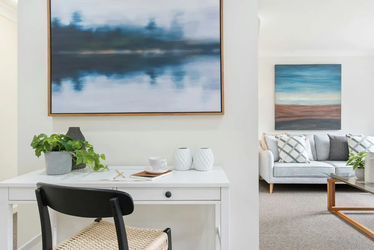 Light, bright and blue coastal living space, coastal office design, blue, white and grey living room